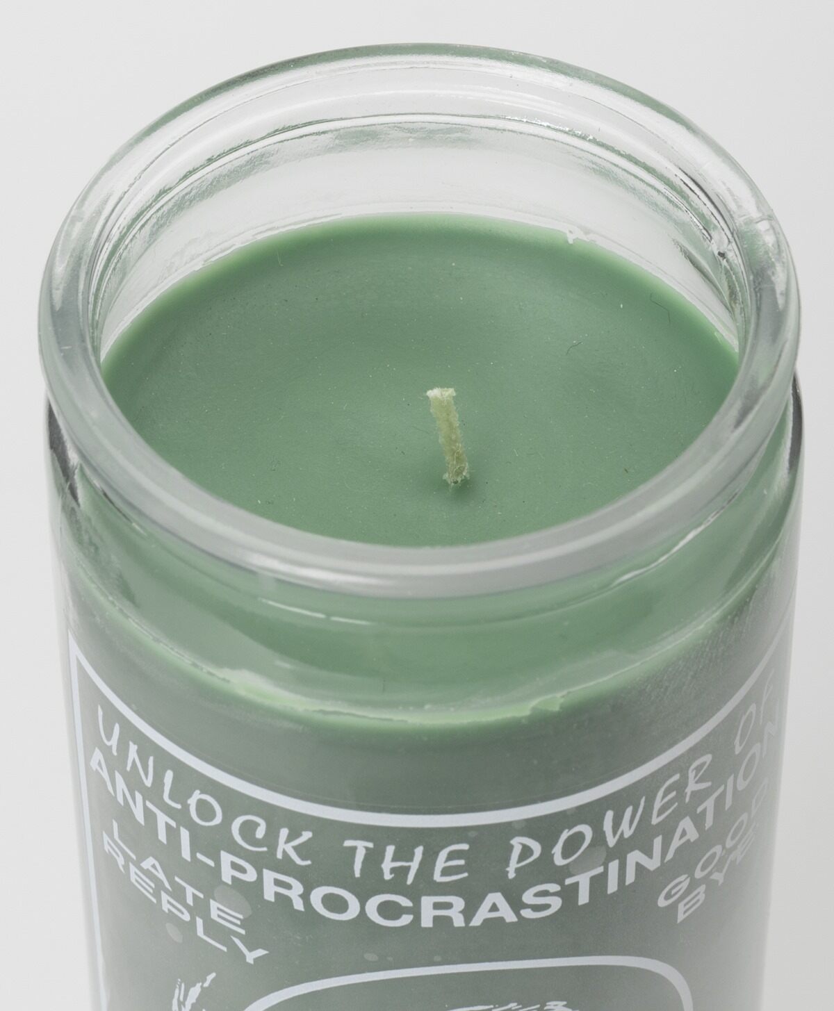 CALLUM PRESTON - PROCRASTINATION PRAYER CANDLE GREEN WAX/WHITE PRINT