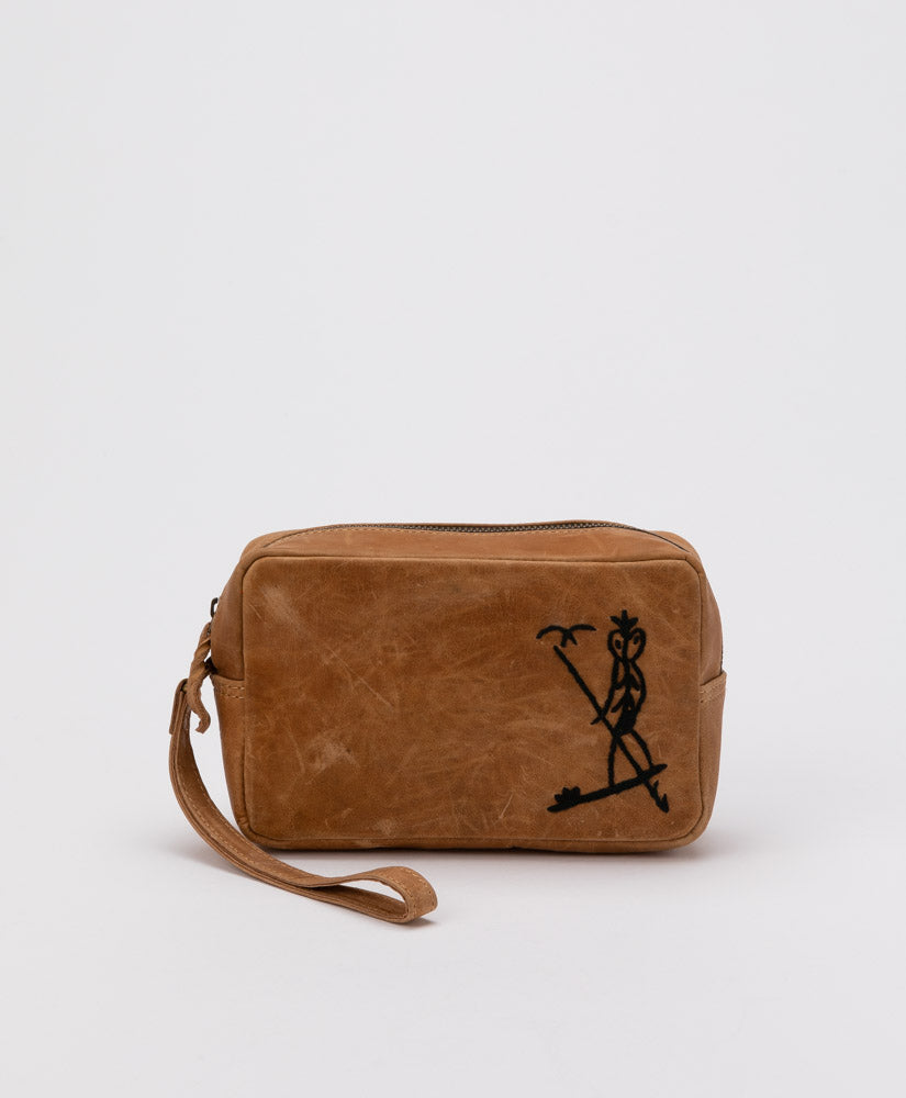 BETTER WORLD ARTS - CEDRIC VARCOE NGURUNDERI CANOE MAN EMBROIDERED TOILETRY BAG